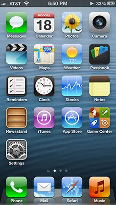 iOS 6's Home Screen, with applications Messages, Calendar, Photos, Camera, Videos, Maps, Weather, Passbook, Reminders, Clock, Stocks, Notes, Newsstand, iTunes, App Store, Game Center, and Settings. Phone, Mail, Safari, and Music are on the dock.
